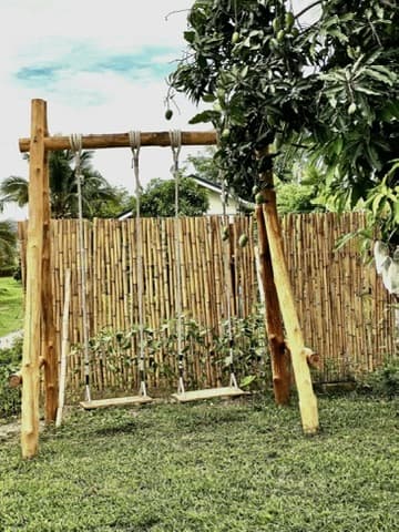 Bamboo swing in the garden.